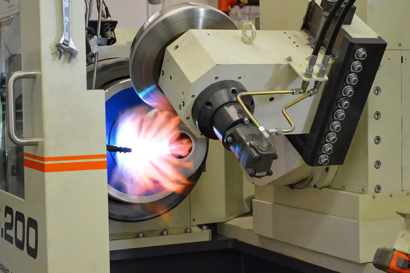 Automated machining process with thermal forming inside a pressure vessel liner during advanced fabrication at Steelhead Composites.