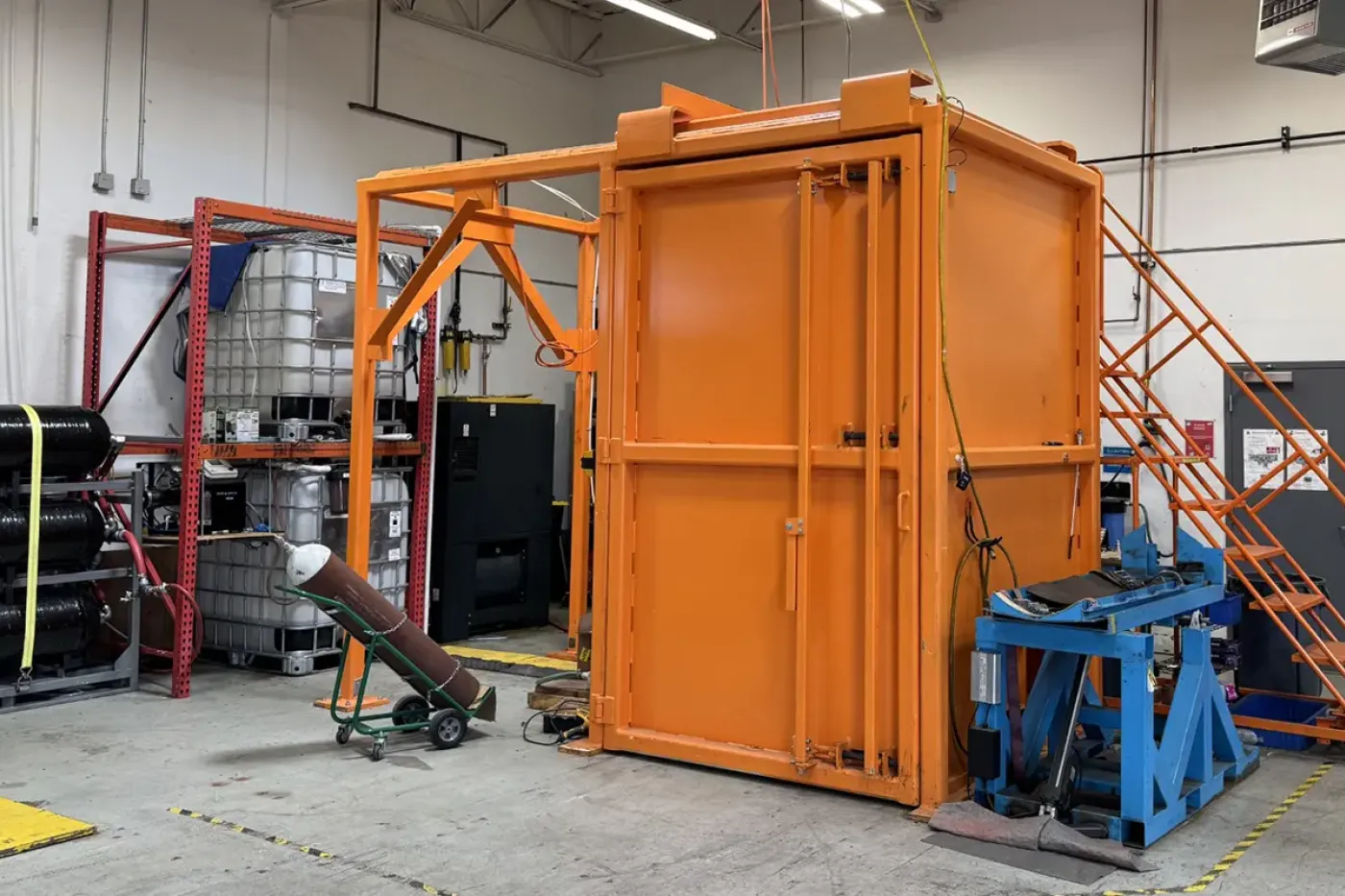 Steelhead Composites recertification facility with retesting area for pressure vessels, tanks, and cylinders, ensuring compliance and extended service life.